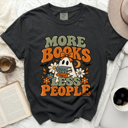 Black t-shirt with "More Books Less People" ghost and book graphic.