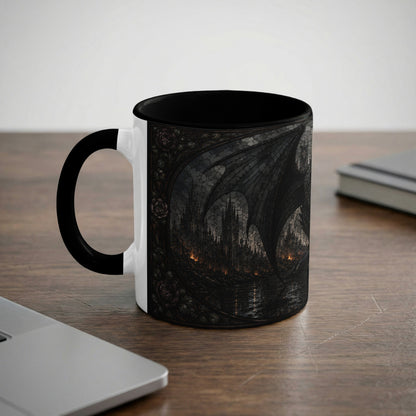 White mug with black handle features dark gothic artwork of a dragon over a city.