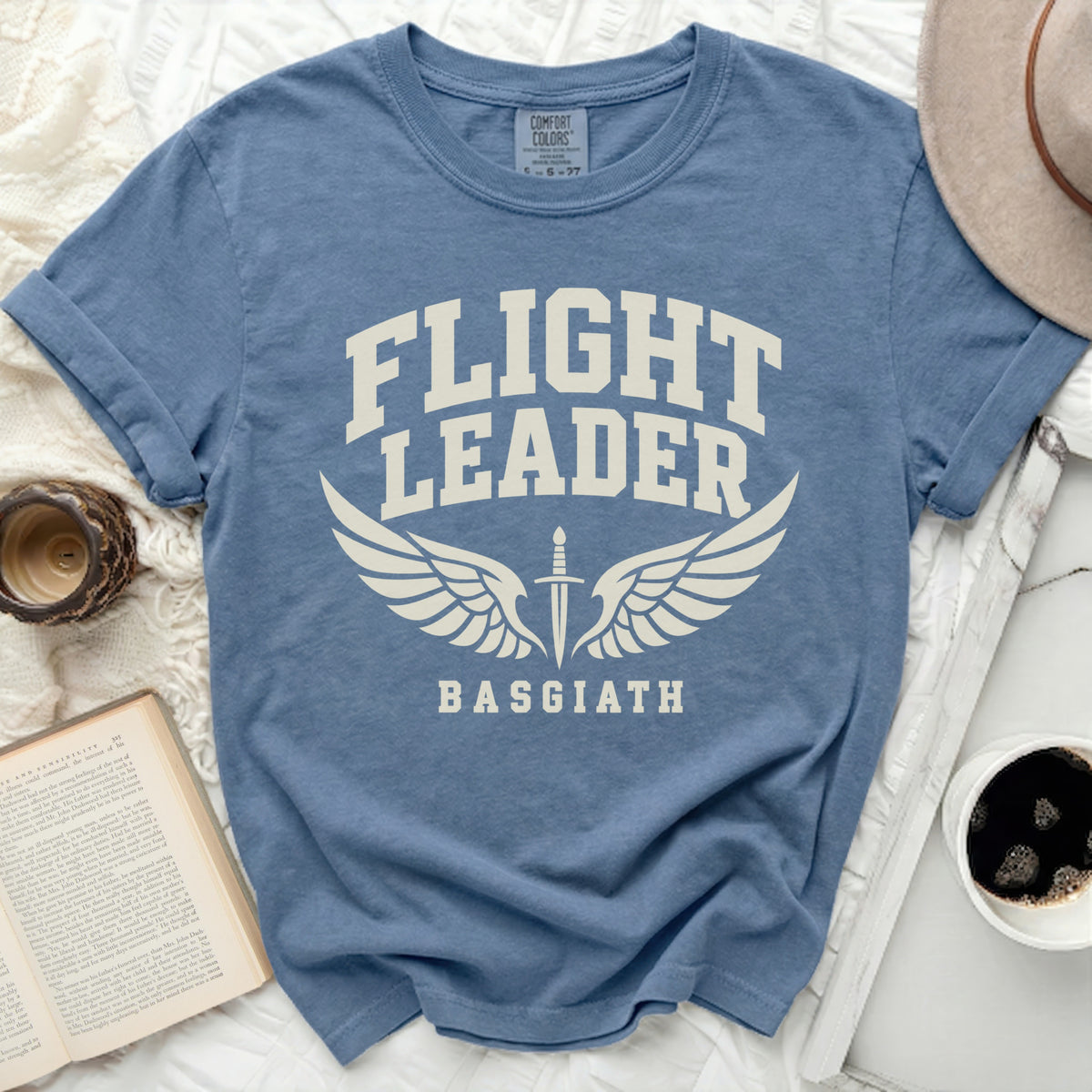 Blue t-shirt with "Flight Leader Basgiath" text and winged sword graphic.
