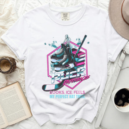 T-shirt with hockey skates, stick, and text: Books, Ice. Feels. My Perfect Hat Trick.