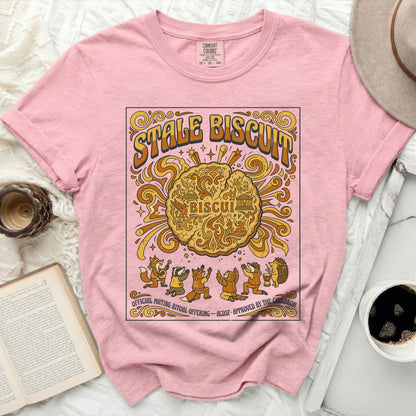 Pink t-shirt with "Stale Biscuit" graphic featuring woodland creatures and a biscuit.