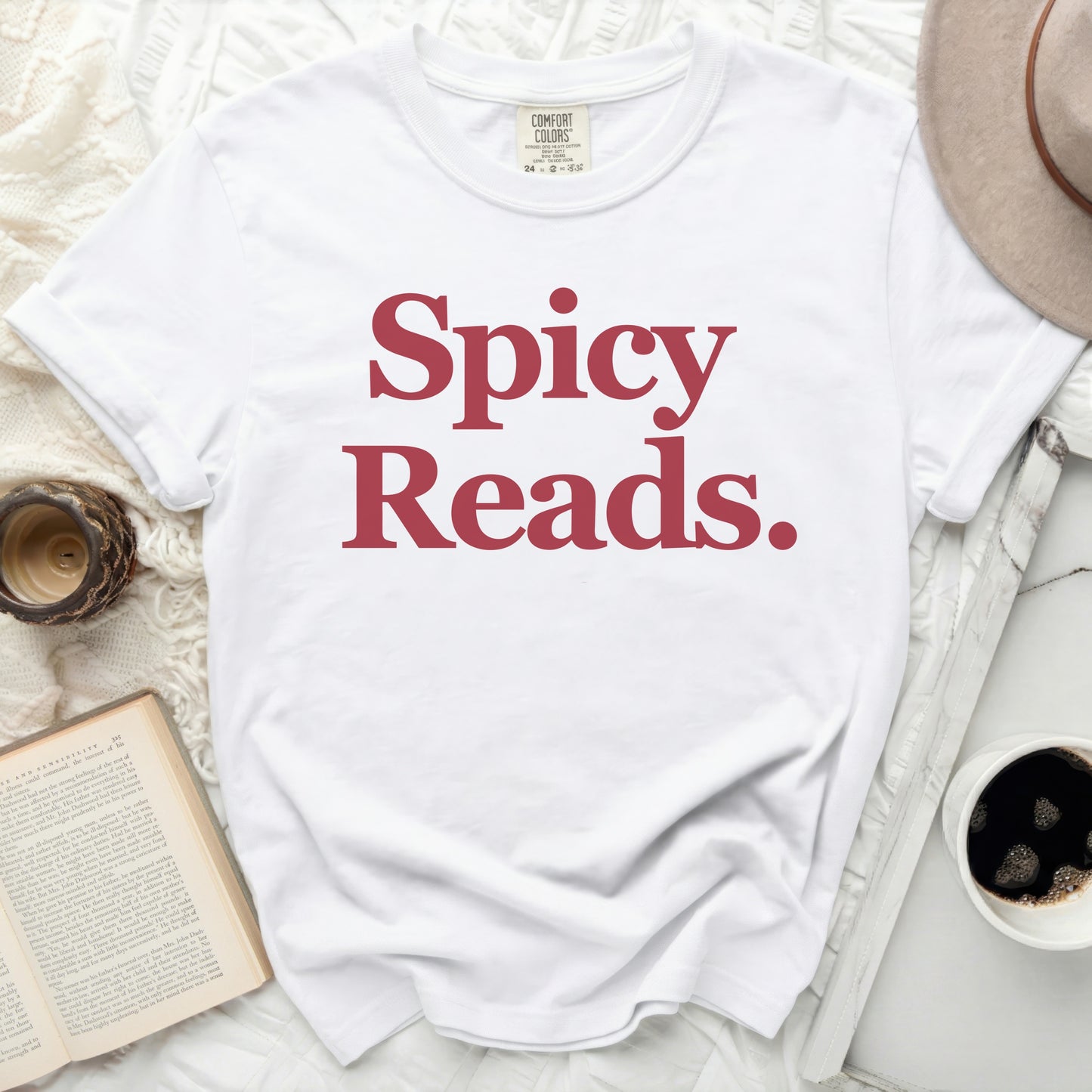 White t-shirt with red text "Spicy Reads."