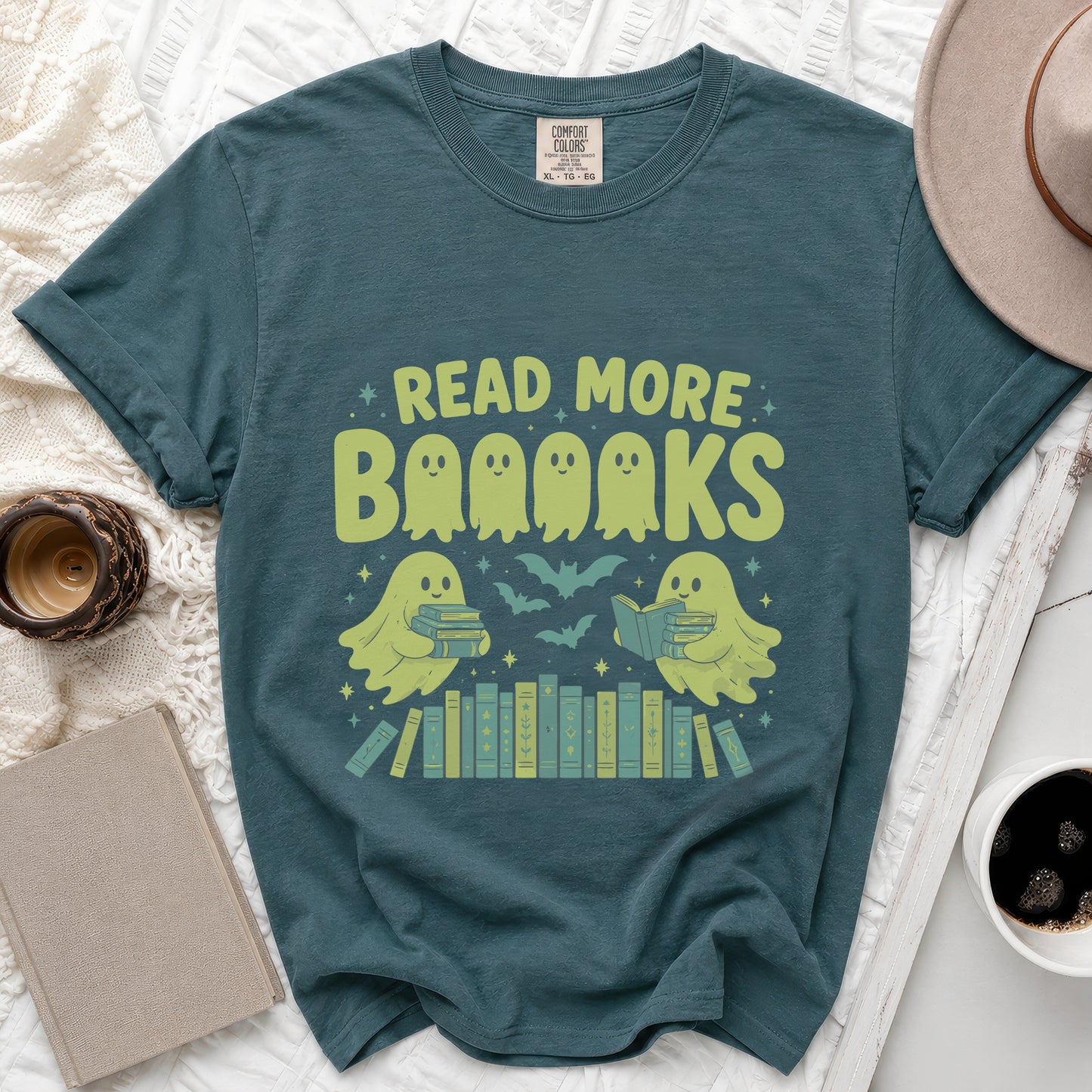 Teal t-shirt with "Read More Booooks" text featuring ghosts and books.