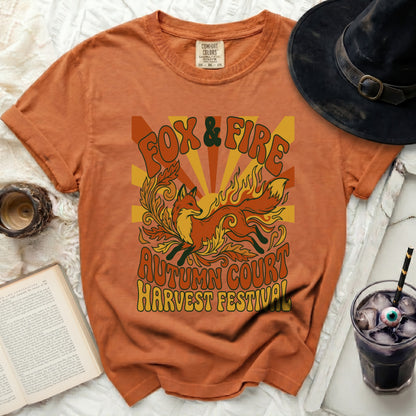 Orange t-shirt with "Fox & Fire Autumn Court Harvest Festival" graphic.