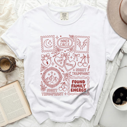 White Comfort Colors t-shirt with red line art including moons, hearts, wings, and text.