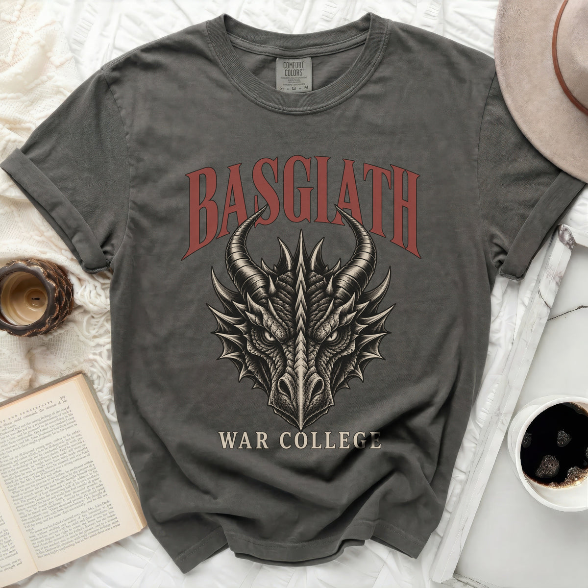 Dark grey t-shirt with red text "BASGIATH WAR COLLEGE" and dragon graphic.