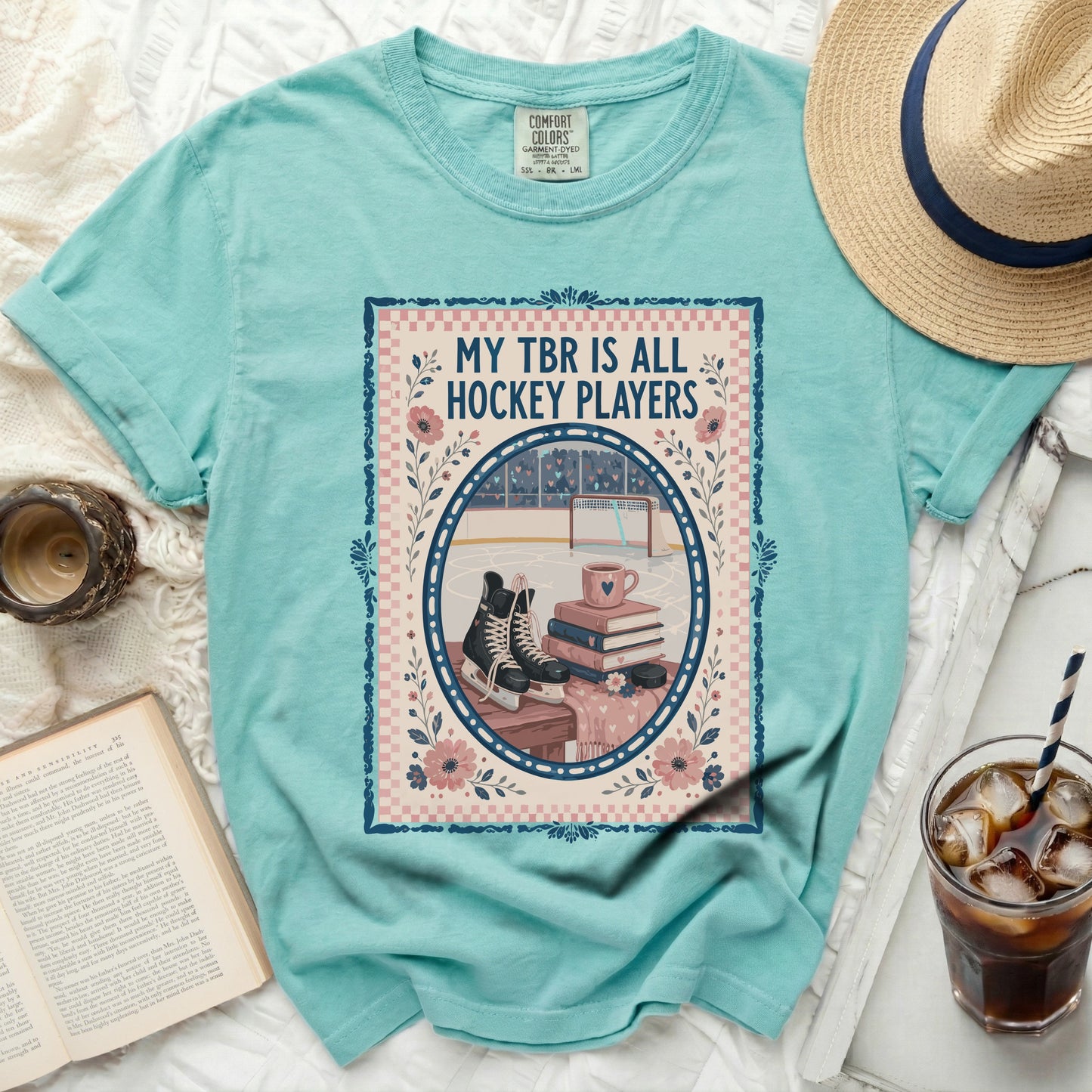 Teal t-shirt with "My TBR is All Hockey Players" text and ice hockey scene.