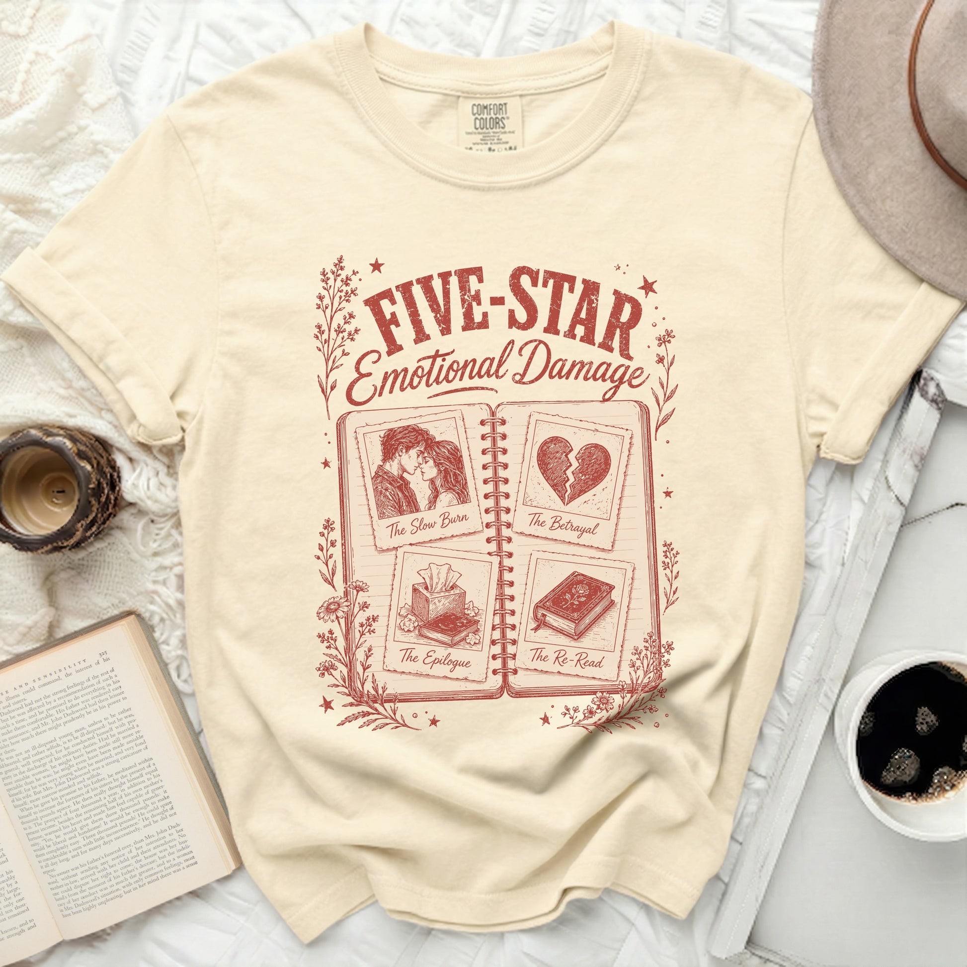 Cream t-shirt with "Five-Star Emotional Damage" and book chapter titles.