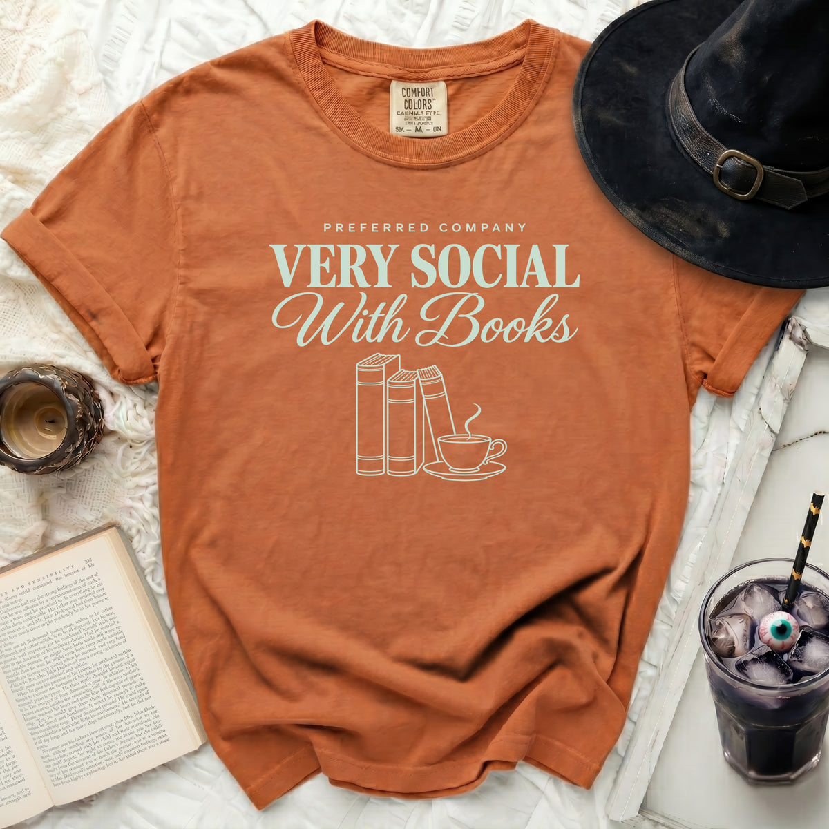 Comfort Colors t-shirt with "Very Social With Books" text and book graphic.