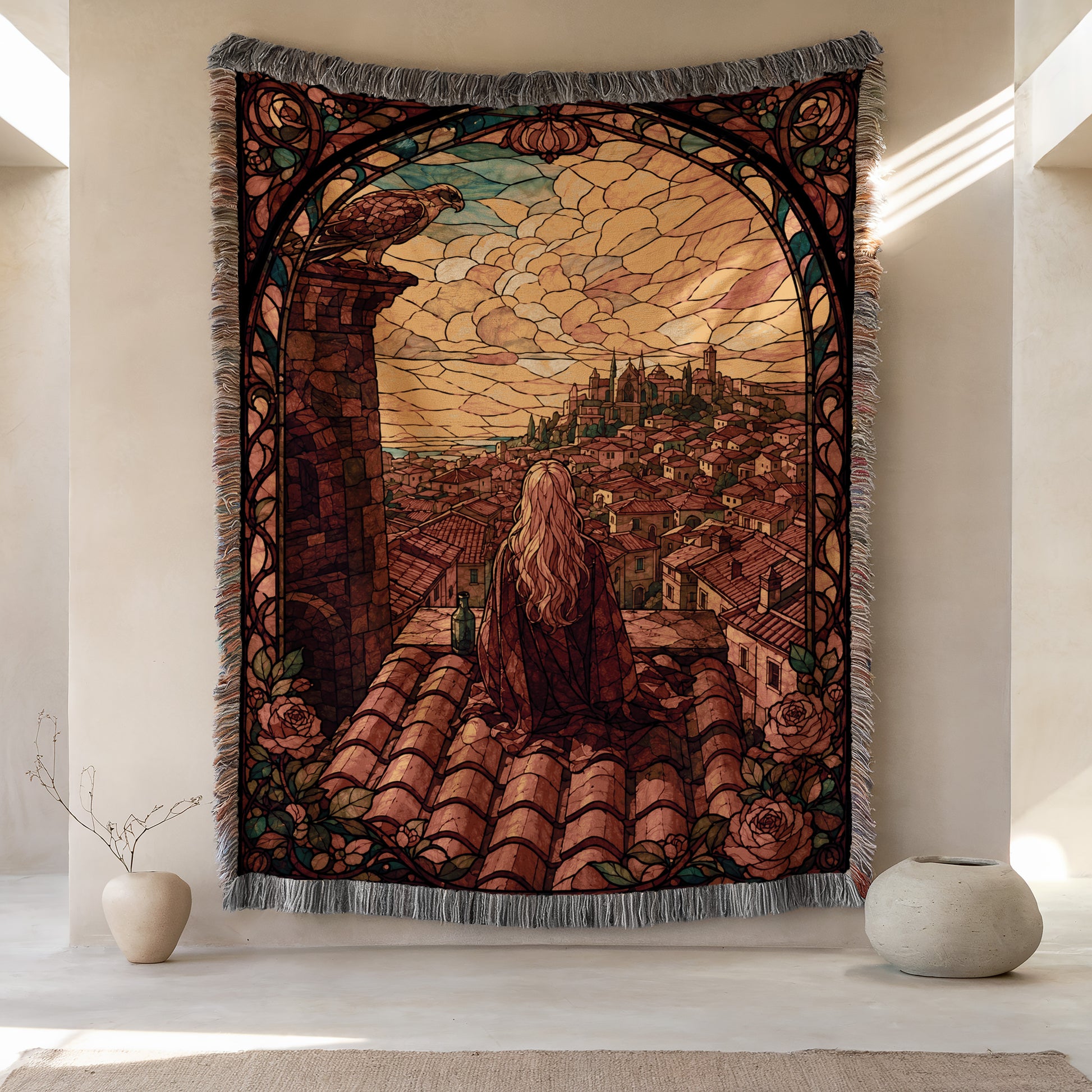 a large tapestry hanging on a wall, depicting a woman sitting on a rooftop with a cityscape in the background. The tapestry is framed with a decorative border and has a floral pattern. There are two small vases placed on either side of the tapestry, and the overall scene has a warm and inviting atmosphere.
