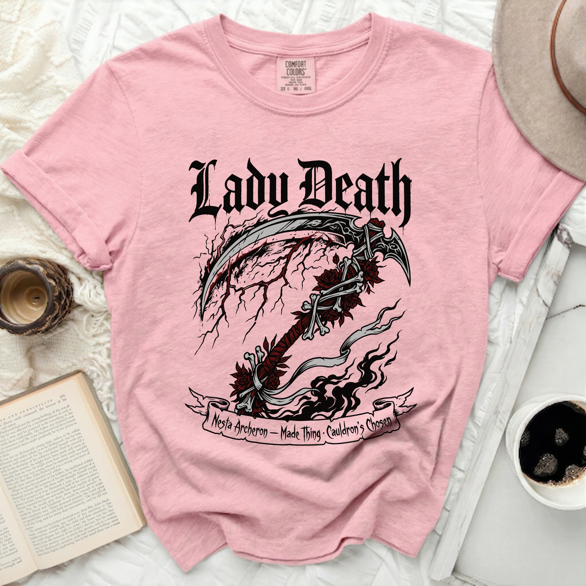 Pink t-shirt with "Lady Death" and grim reaper scythe graphic.