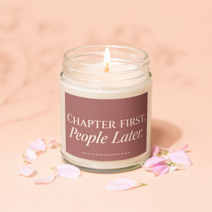 Candle with text "CHAPTER FIRST. People Later." on a pink background with petals.