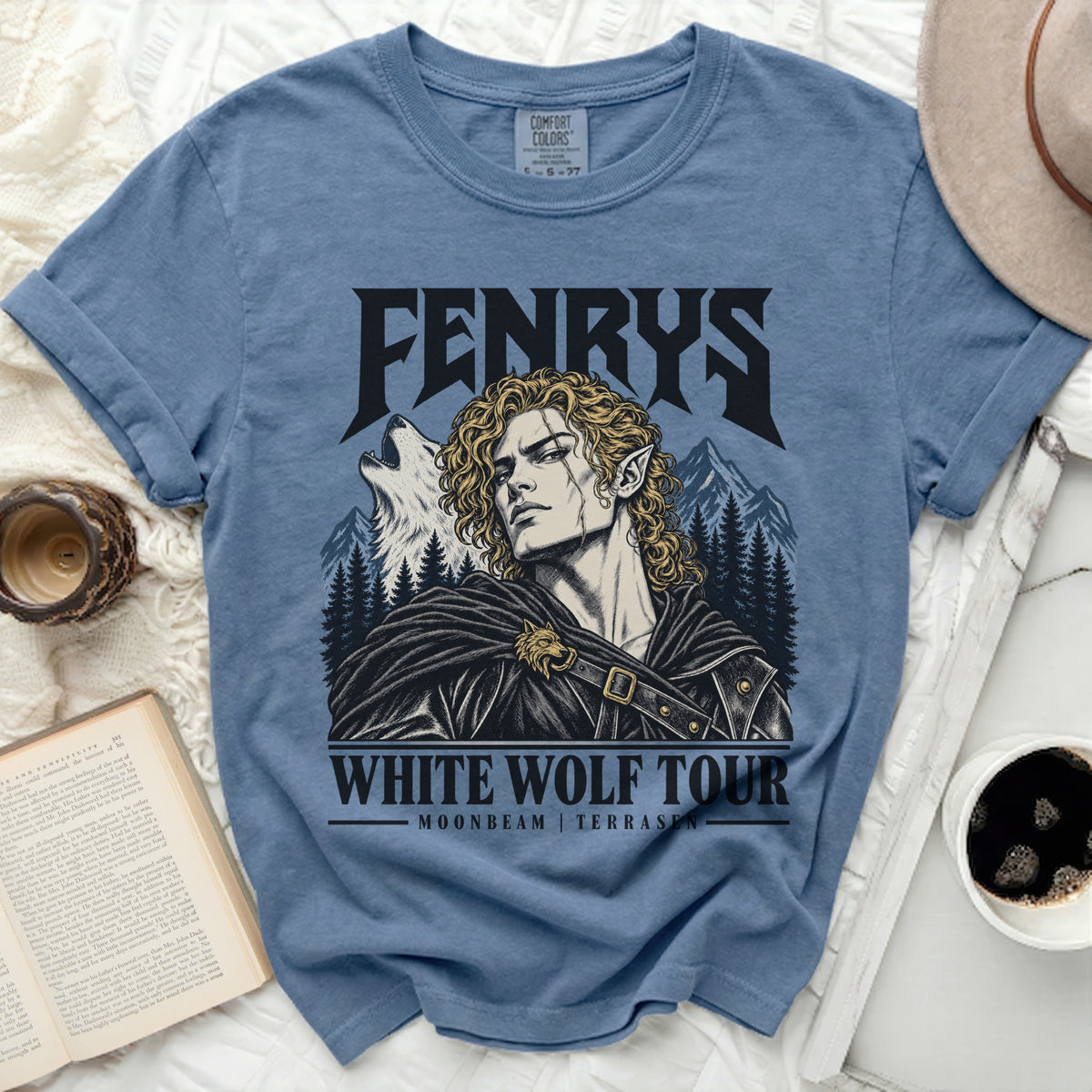Blue t-shirt with "Fenrys White Wolf Tour" graphic featuring a man and wolf.