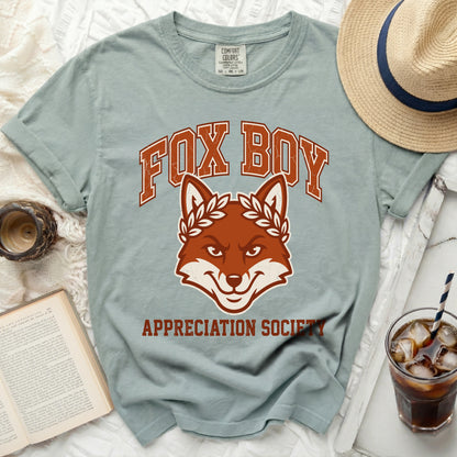"Fox Boy Appreciation Society" graphic on a light green t-shirt.