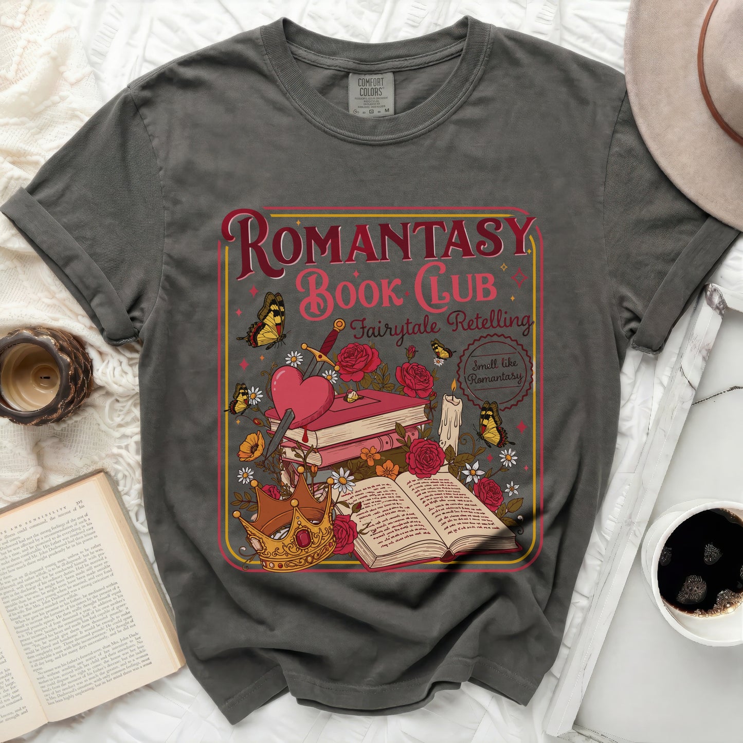 Romantasy Book Club graphic on a grey t-shirt with books, crown, sword, and butterflies.