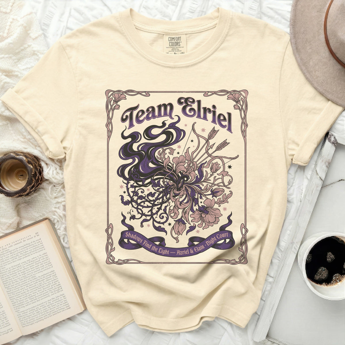 Cream t-shirt with "Team Elriel" and floral graphics.