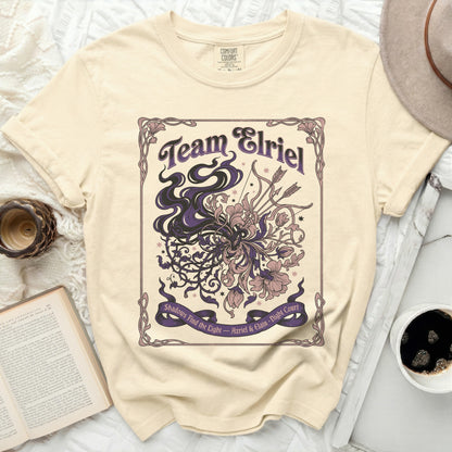 Cream t-shirt with "Team Elriel" and floral graphics.