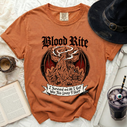 Orange t-shirt with "Blood Rite" and a mountain graphic, "I survived and all I got was this lousy t-shirt".