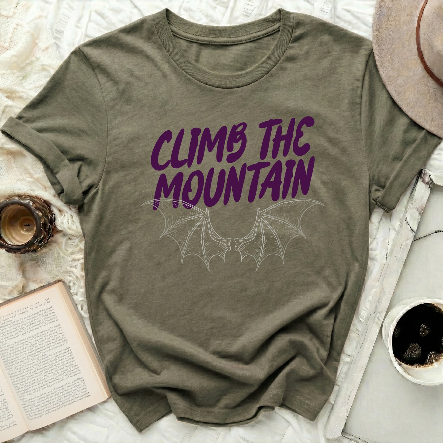 CLIMB THE MOUNTAIN Bat Wings Graphic Design product type
T-shirt
Graphic tee
Mountain climbing
Climb the mountain
Bat wings
Wings design
Adventure shirt
Outdoor shirt
Hiking tee
Inspirational quote
Unique design
Nature lover
Olive green
Short sleeve
Casual wear
Unisex shirt
Gift idea
Statement tee
Explore shirt
Fantasy design