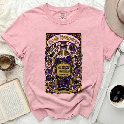 Pink t-shirt with "Book Hangover" design featuring a purple bottle.