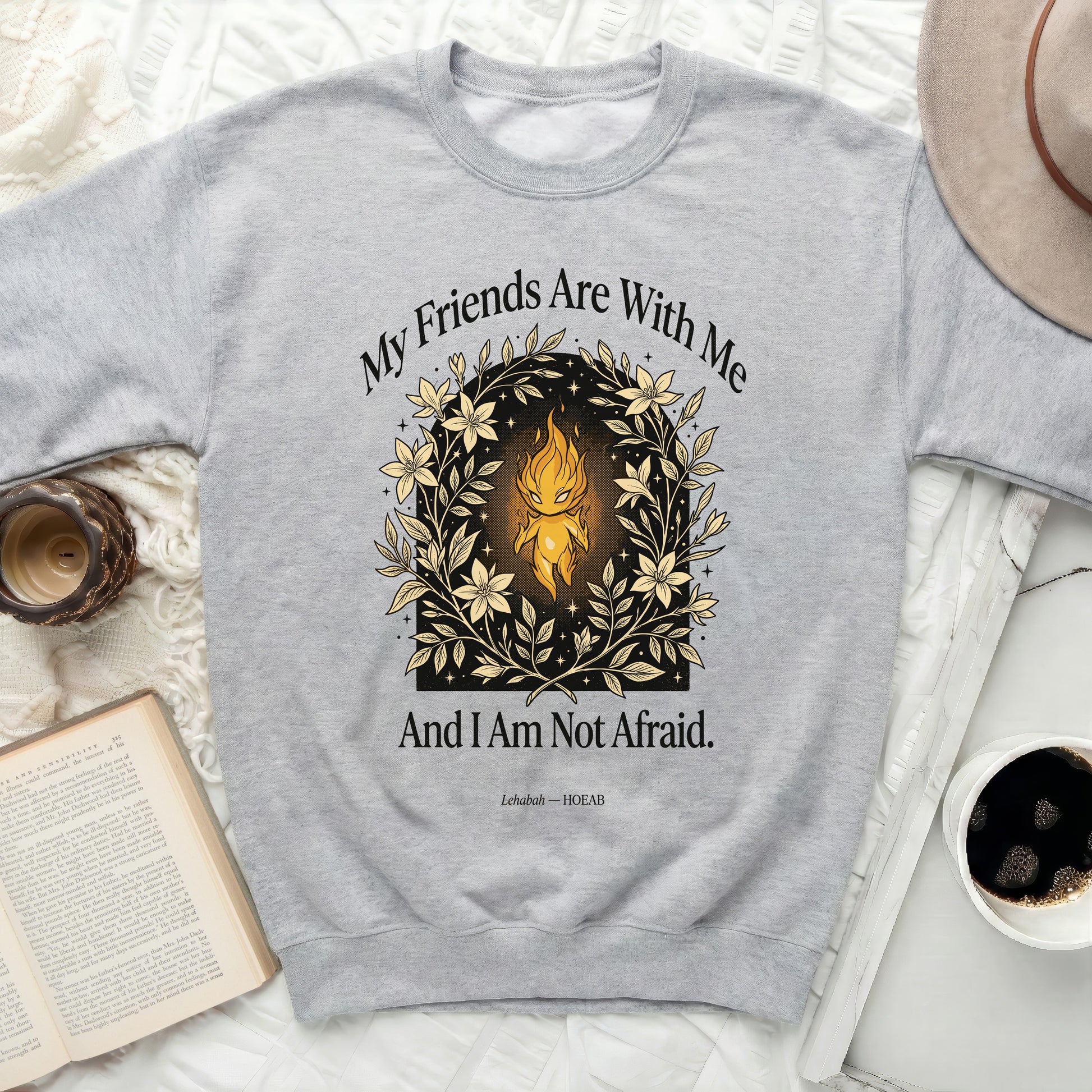Grey crewneck sweatshirt with "My Friends Are With Me And I Am Not Afraid." text and fire-like graphic.
