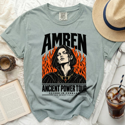 Green shirt with "AMREN ANCIENT POWER TOUR" text and flaming portrait.
