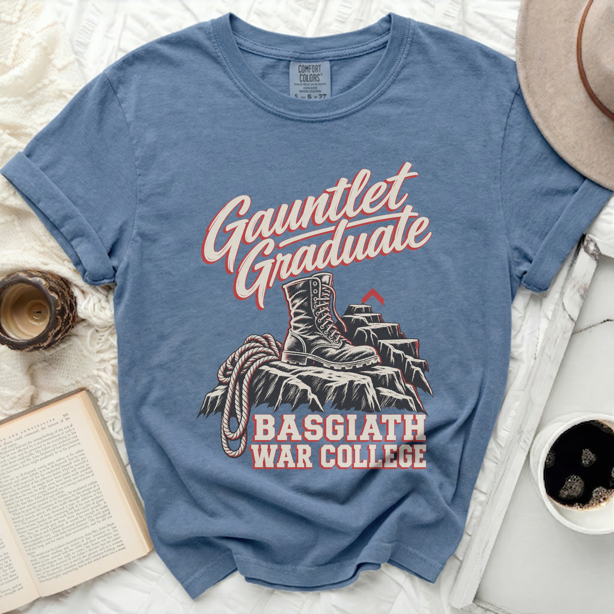 Gauntlet Graduate t-shirt with boot and rope on rocky terrain, Basgiath War College text.