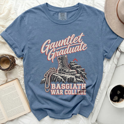 Gauntlet Graduate t-shirt with boot and rope on rocky terrain, Basgiath War College text.