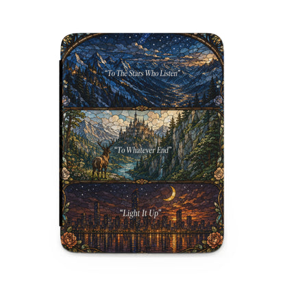Stained glass art showing mountains, castle, deer, and city skyline with quotes.