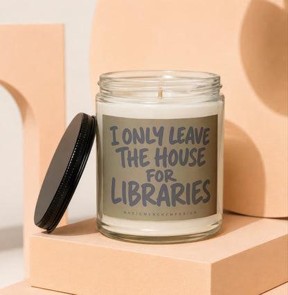 Glass jar candle with "I only leave the house for libraries" text and black lid.