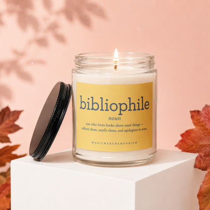 Lidded glass candle with "bibliophile noun one who loves books above most things—collects them, smells them, and apologizes to none." text.