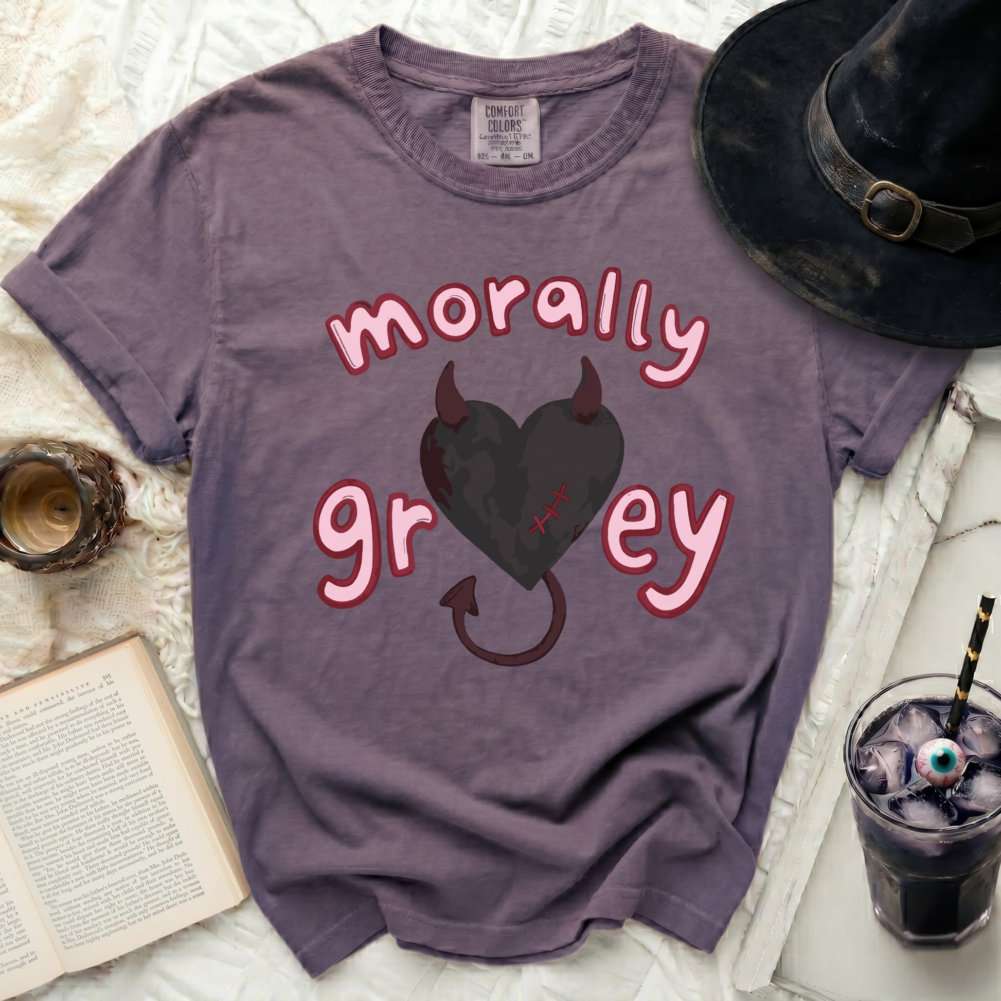 Purple t-shirt with a pink-outlined heart and "morally grey" text.