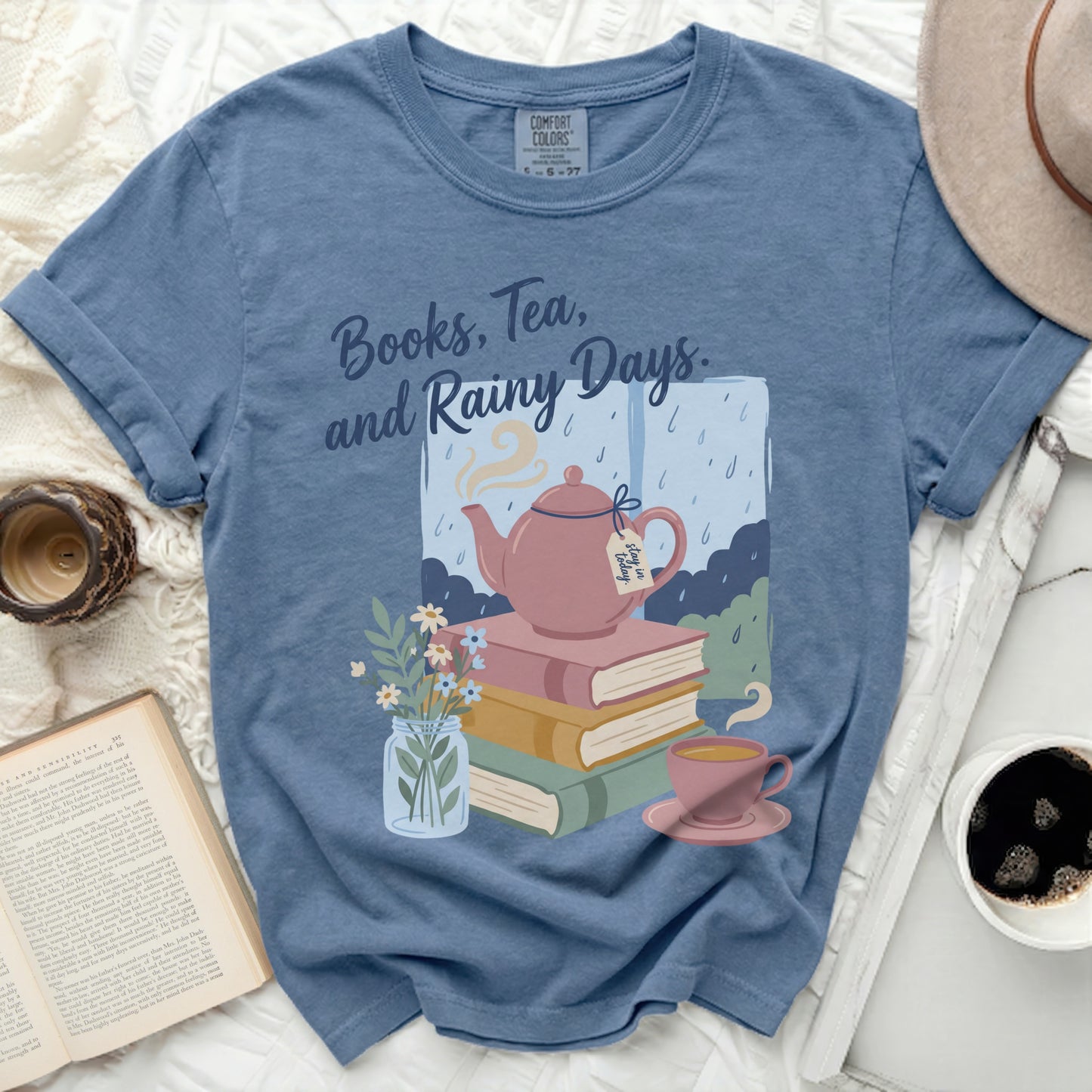Blue t-shirt with "Books, Tea, and Rainy Days" graphic.