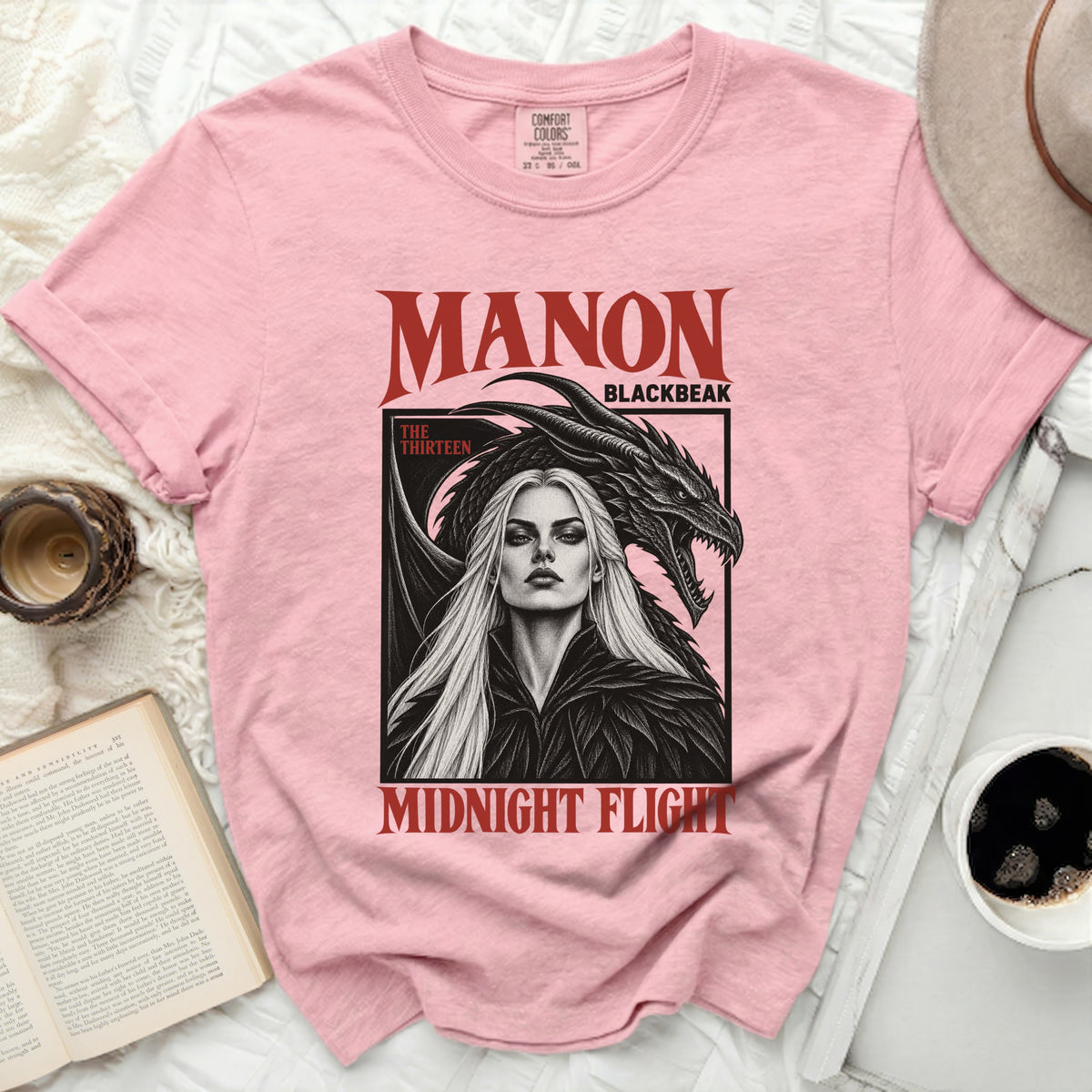 Pink t-shirt with Manon Blackbeak Midnight Flight dragon and woman graphic.