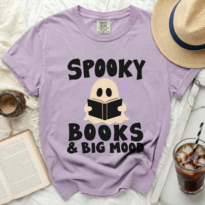 Purple t-shirt with "Spooky Books & Big Mood" text and ghost illustration.