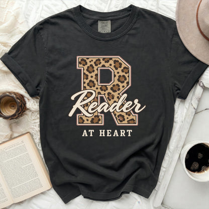 Black Comfort Colors t-shirt with leopard print "R" and "Reader AT HEART" text.