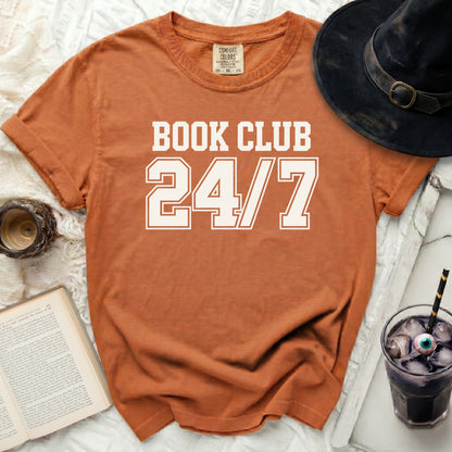 Orange t-shirt with white text "BOOK CLUB 24/7" and Comfort Colors tag.