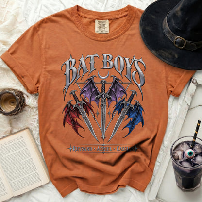 Orange t-shirt with "Bat Boys" and swords graphic, names Rhysand, Azriel, Cassian.