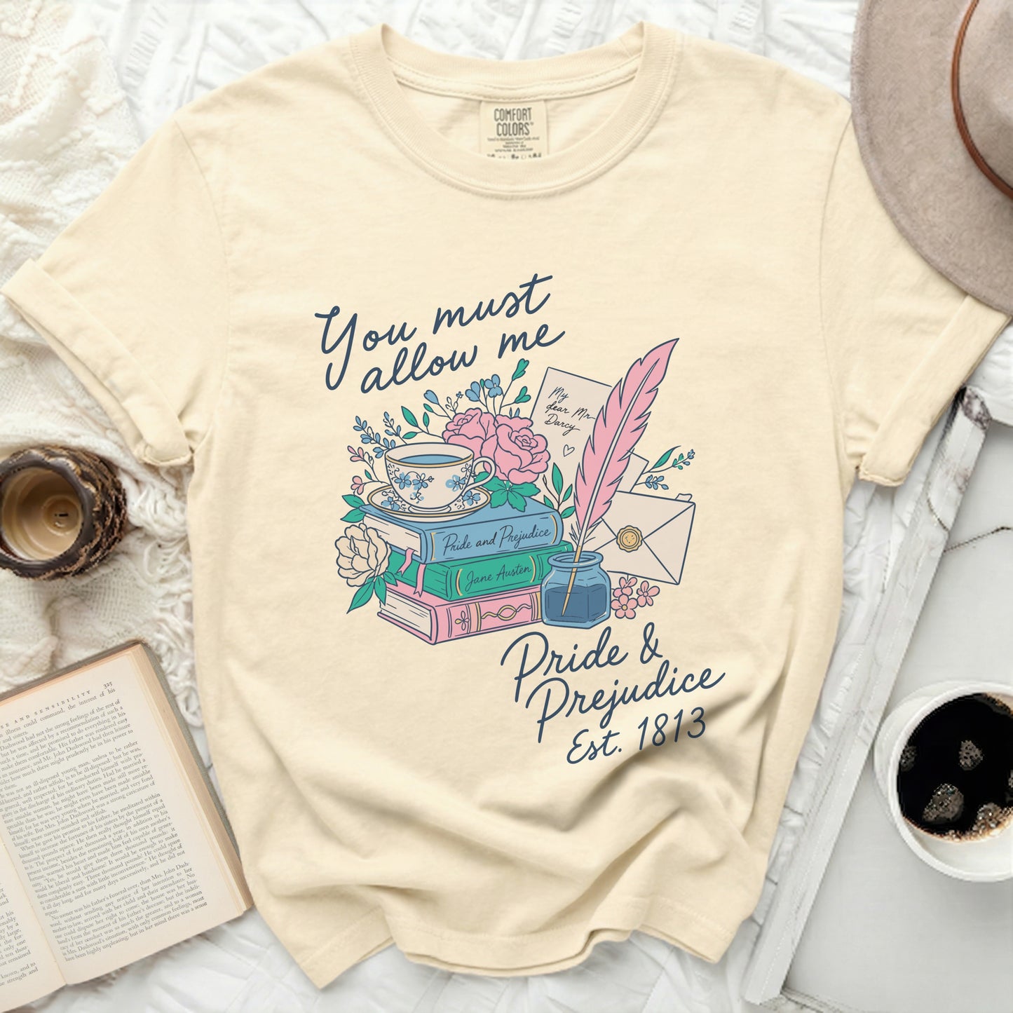 Cream t-shirt with Pride and Prejudice illustration and text.