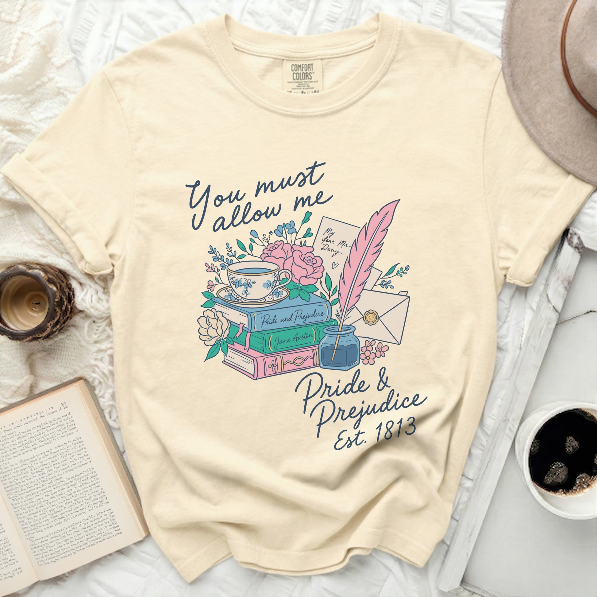 Cream t-shirt with Pride and Prejudice illustration and text.