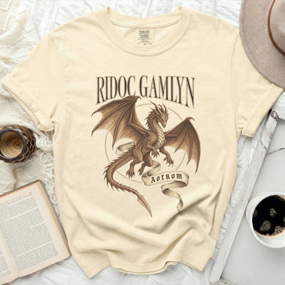 Cream t-shirt with dragon graphic, text "RIDOC GAMLYN", and "AOTROM".