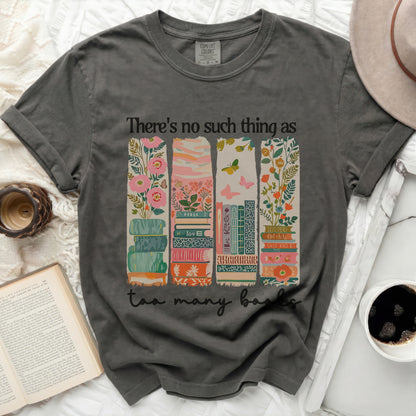 Dark gray t-shirt with "There's no such thing as too many books" and stacked books graphic.
