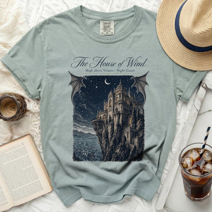 The House of Wind t-shirt with castle, stars, and crescent moon design.