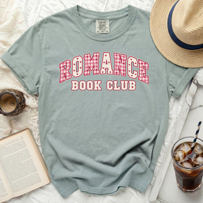 Light blue t-shirt with "Romance Book Club" text in pink gingham and hearts.