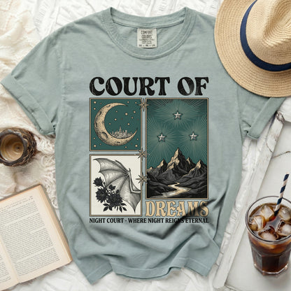 Court of Dreams shirt with moon, stars, bat wings, and mountains design.