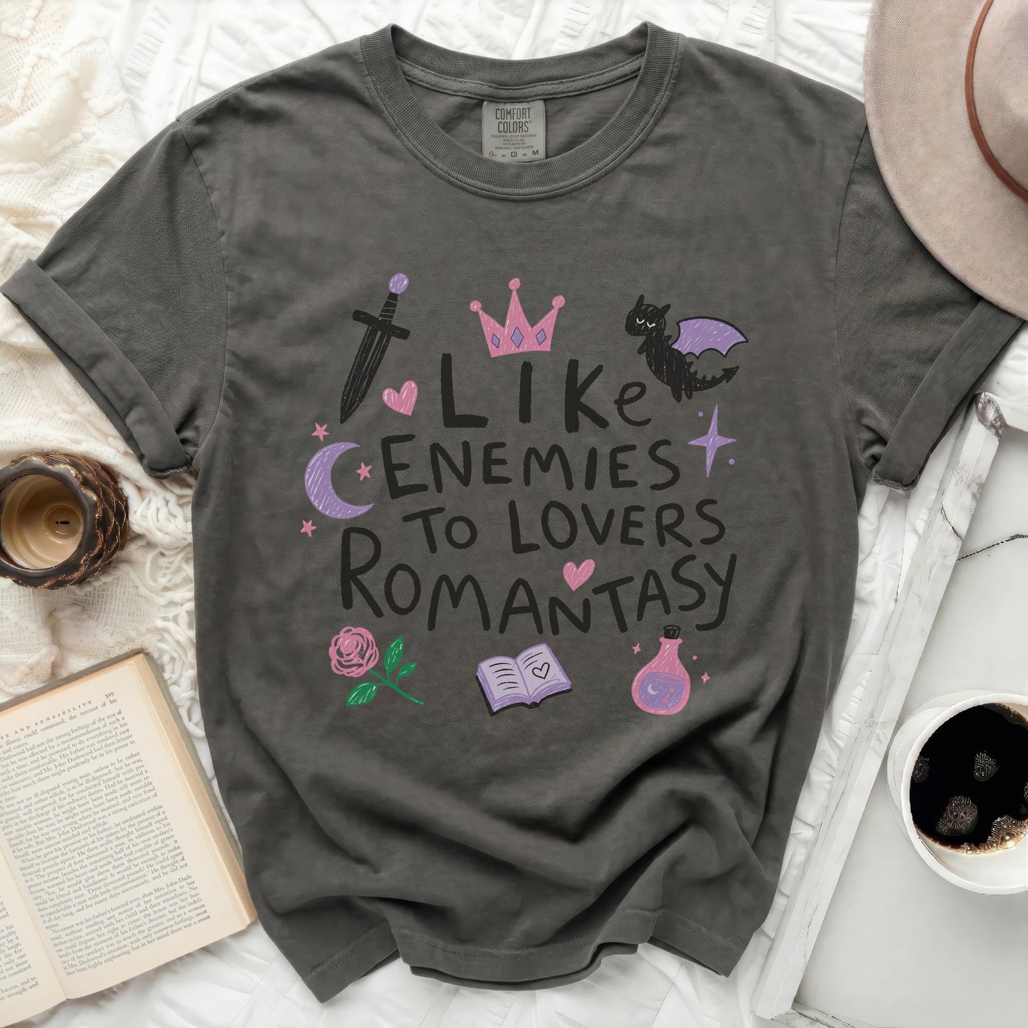 Dark grey "Comfort Colors" t-shirt with "Like Enemies To Lovers Romantasy" text and illustrations.
