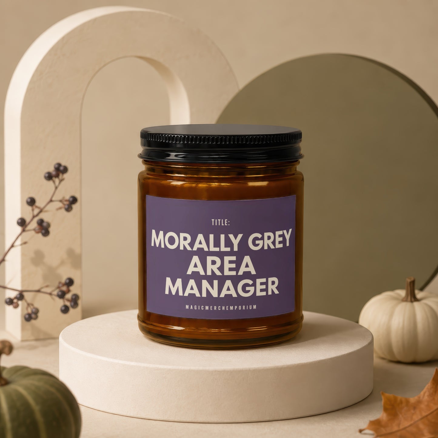 Amber jar candle with black lid, reads "Morally Grey Area Manager" and "MagicMerchEmporium".
