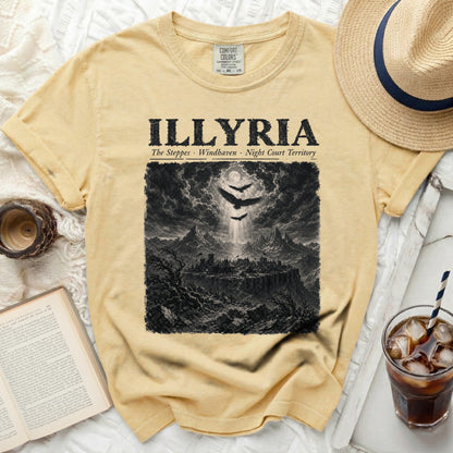 Yellow t-shirt with "ILLYRIA" and drawing of a medieval city with birds.