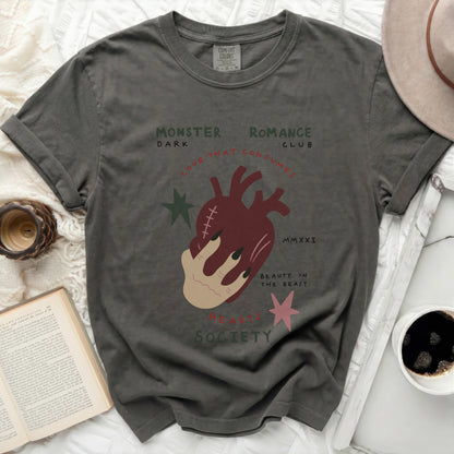 Dark Romance Club Monster Society t-shirt with heart and hand graphic.