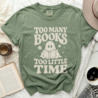 Green t-shirt with "Too Many Books Too Little Time" and a ghost reading a book.